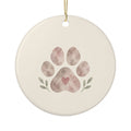 Personalized paw print pet memorial ornament, front: a hand-painted paw print with a small heart