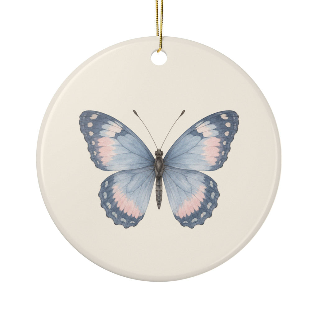 Personalized butterfly memorial ornament, front: a hand-painted butterfly in dusty blue and soft blush
