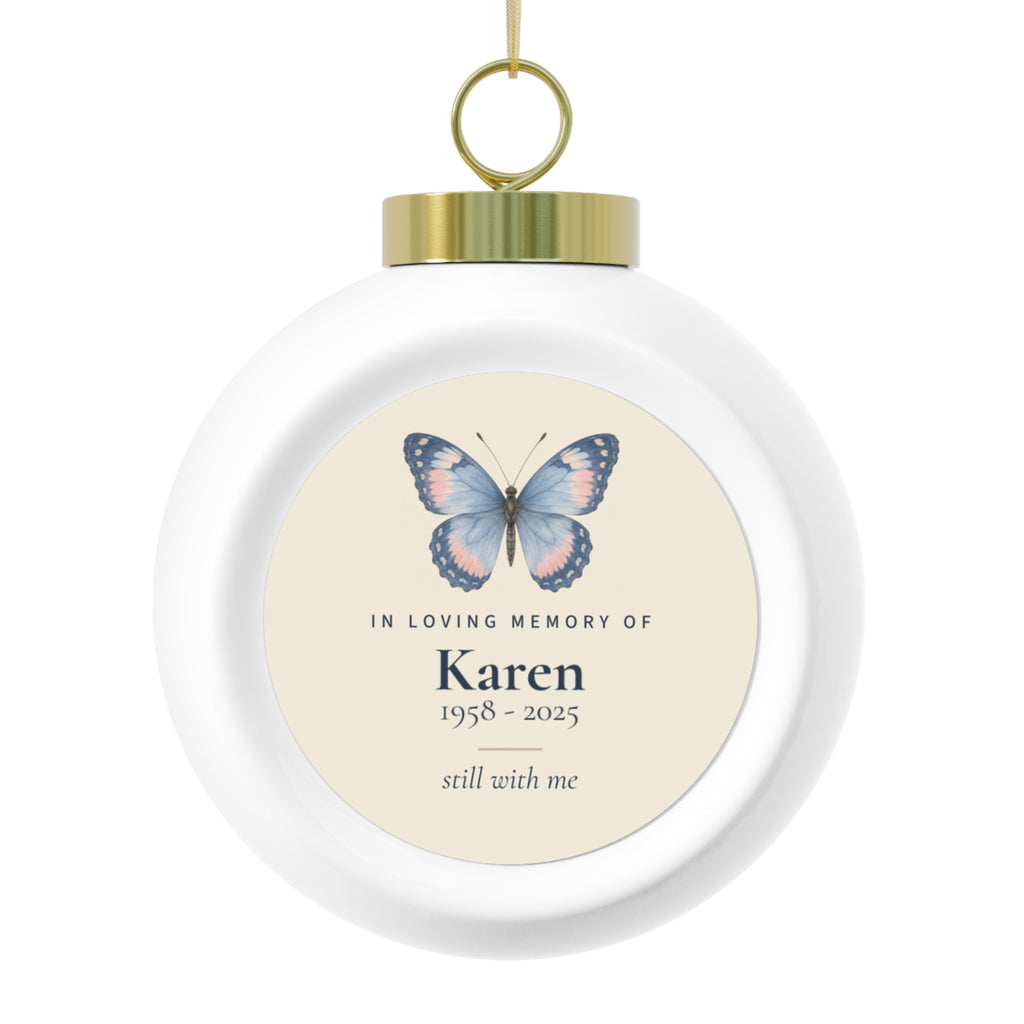 Personalized butterfly memorial Christmas ball, front: a hand-painted butterfly, In Loving Memory Of, the name Karen, 1958 - 2025 and still with me