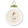 Personalized cardinal memorial Christmas ball, front: a hand-painted cardinal, In Loving Memory Of, the name Carol, 1948 - 2025 and still with me
