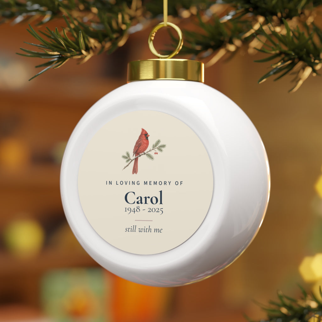 Personalized cardinal Christmas ball ornament on the tree, in loving memory of Carol