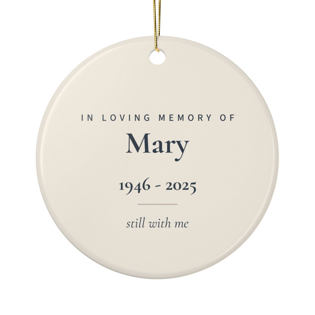 Back of the cardinal memorial ornament: In Loving Memory Of Mary, 1946 - 2025, and the words still with me