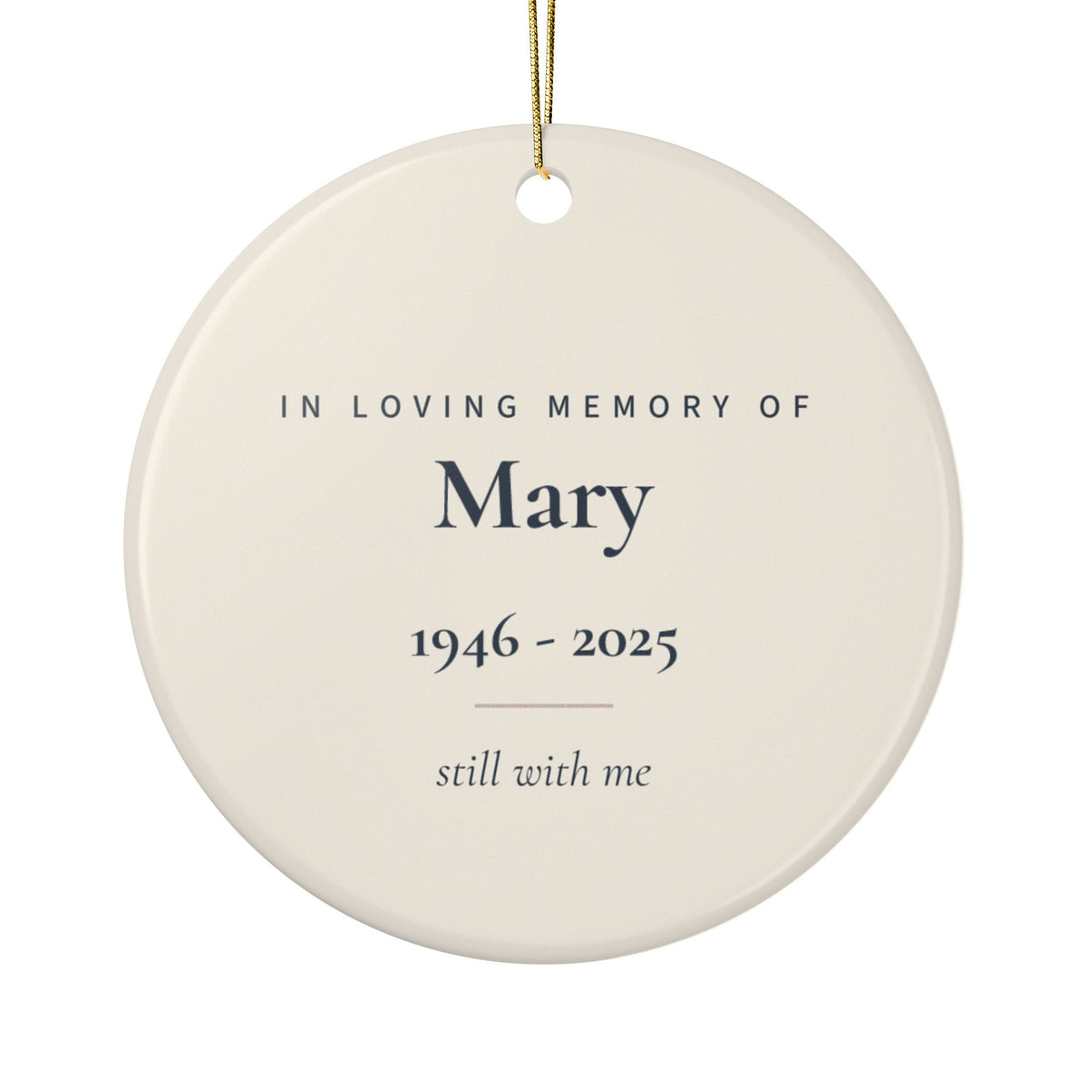 Back of the cardinal memorial ornament: In Loving Memory Of Mary, 1946 - 2025, and the words still with me