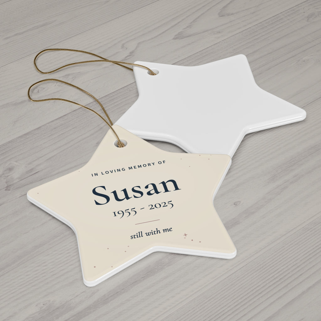 Cream ceramic star memorial ornament for Susan with gold string, printed front and white back