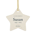 Personalized star memorial ornament in cream with the name Susan and 1955 - 2025 in navy