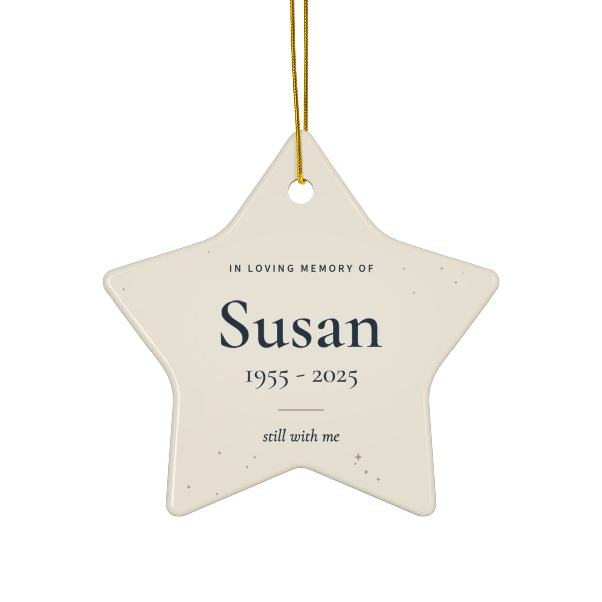 Personalized star memorial ornament in cream with the name Susan and 1955 - 2025 in navy