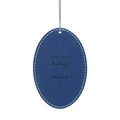 Personalized blue leatherette memorial ornament with silver string, engraved with Richard and still with me