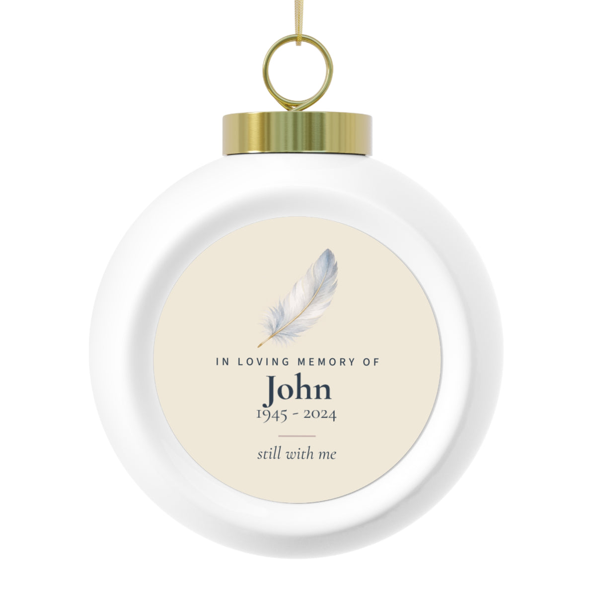 Personalized feather memorial Christmas ball, front: a hand-painted feather, In Loving Memory Of, the name John, 1945 - 2024 and still with me