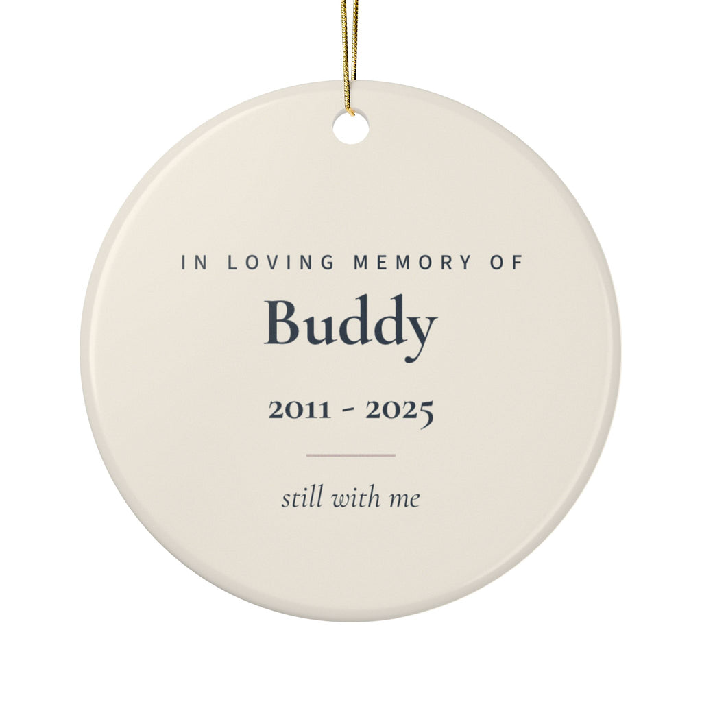 Back of the paw print pet memorial ornament: In Loving Memory Of, the name Buddy, 2011 - 2025 and the words still with me