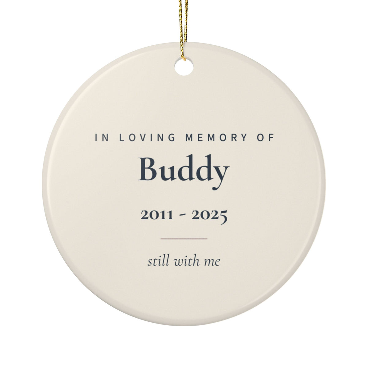 Back of the paw print pet memorial ornament: In Loving Memory Of, the name Buddy, 2011 - 2025 and the words still with me