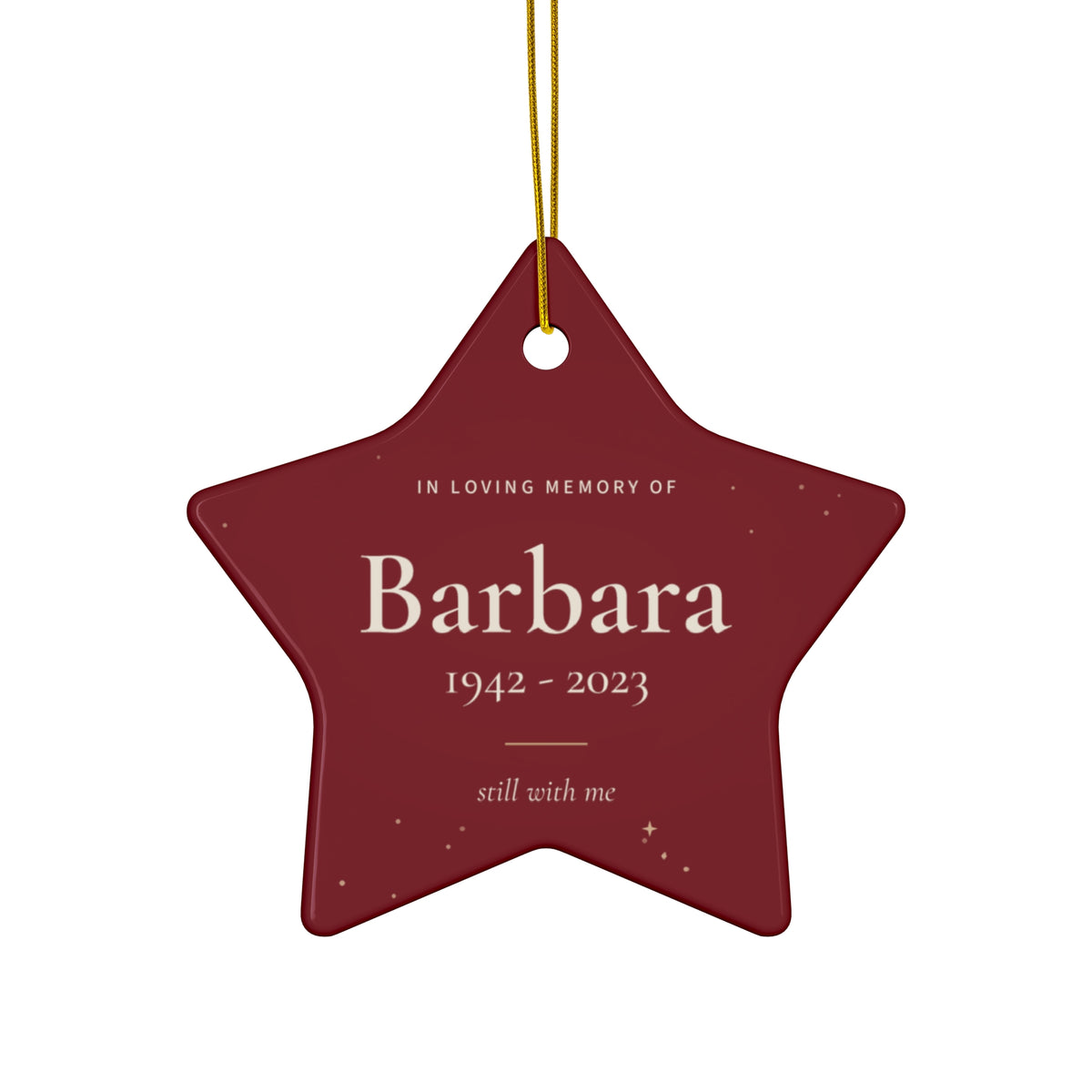Personalized star memorial ornament in Christmas red with the name Barbara and 1942 - 2023