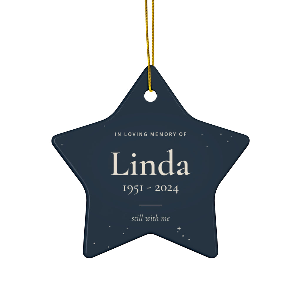 Personalized star memorial ornament in navy with the name Linda and 1951 - 2024