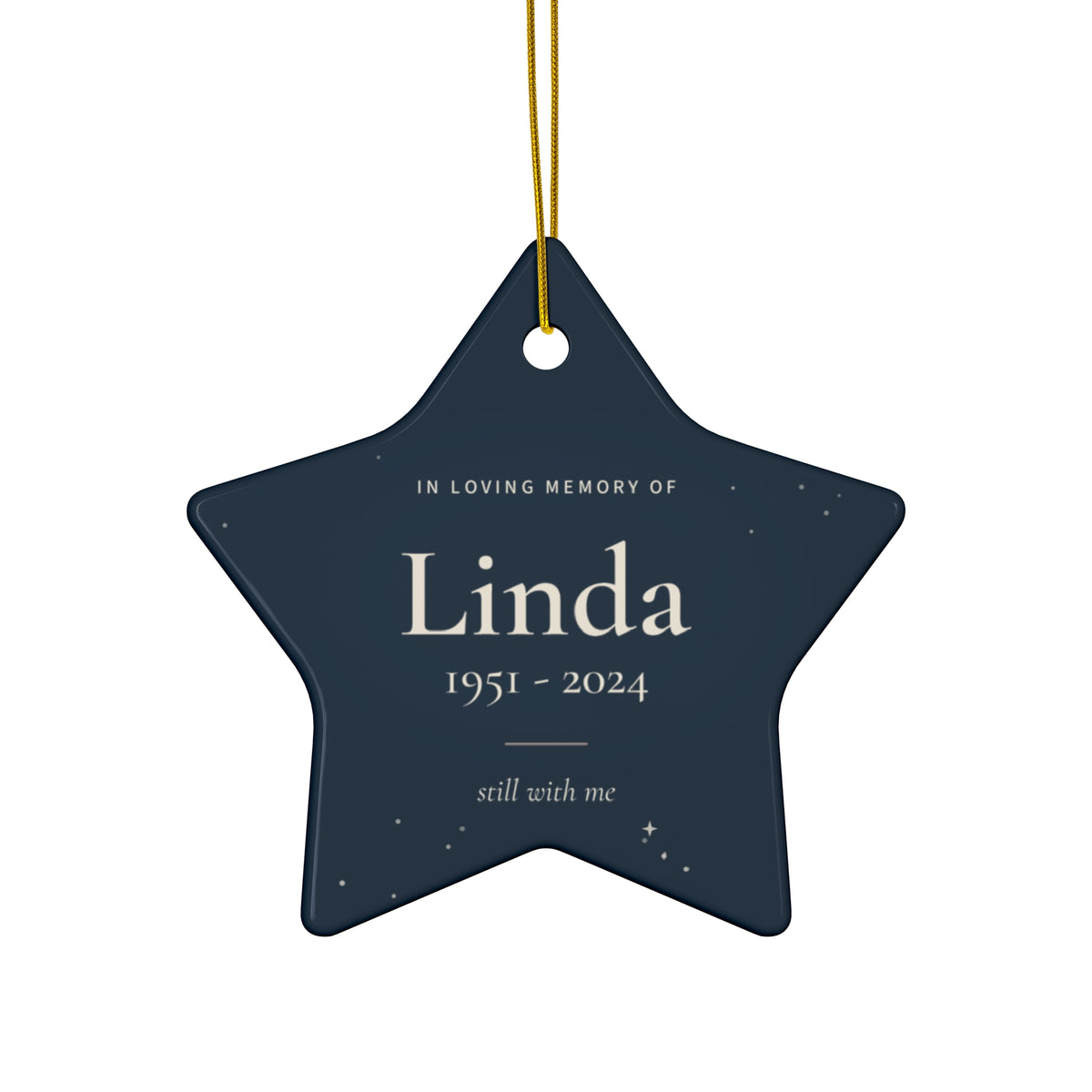 Personalized star memorial ornament in navy with the name Linda and 1951 - 2024